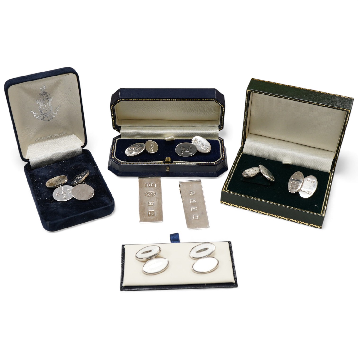 Two modern silver money clips, Michael D. Hillier, Dublin, 1985 and Douglas Pell Silverware, London, 2004, together with three assorted pairs of modern silver oval cufflinks and a similar 925 pair.
